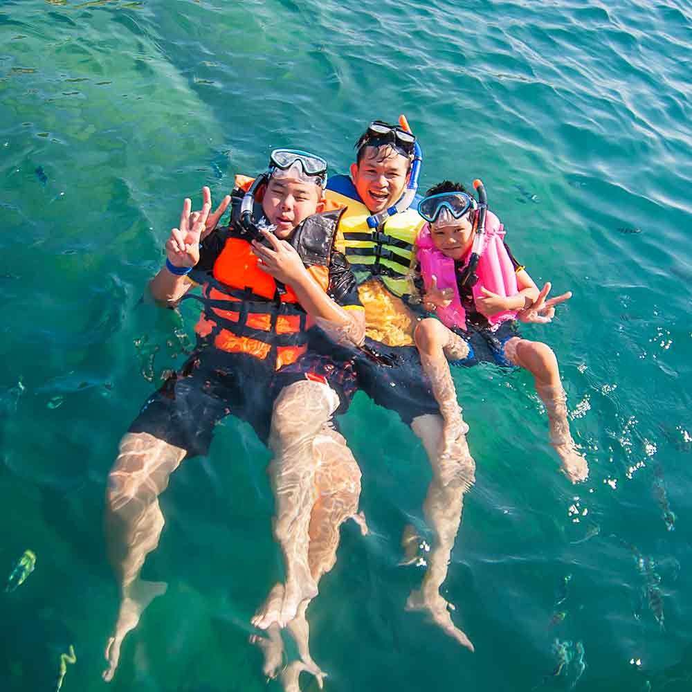 Private boat anchored for snorkeling at Santa Maria Bay Cabo