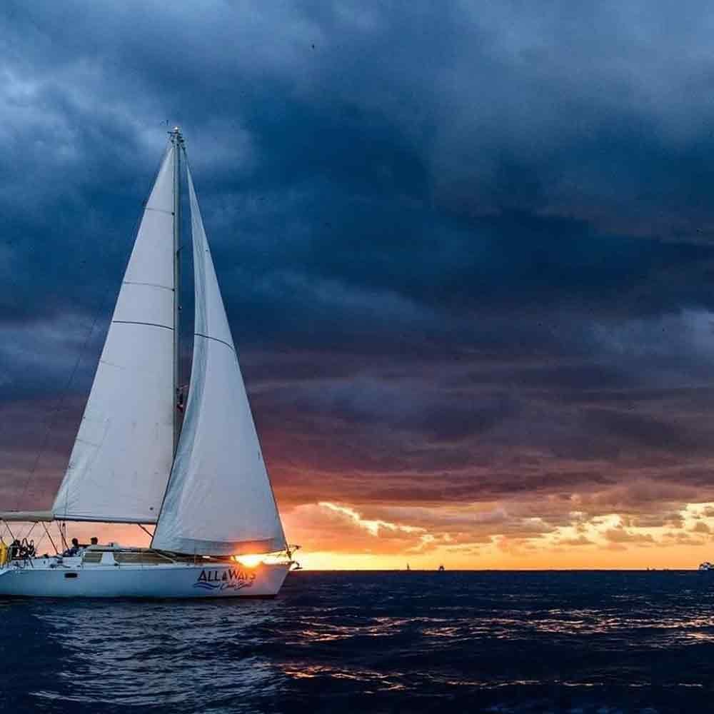 Couple on a romantic private sunset boat rental in Los Cabos